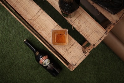 Brown wooden boxes and bottles
